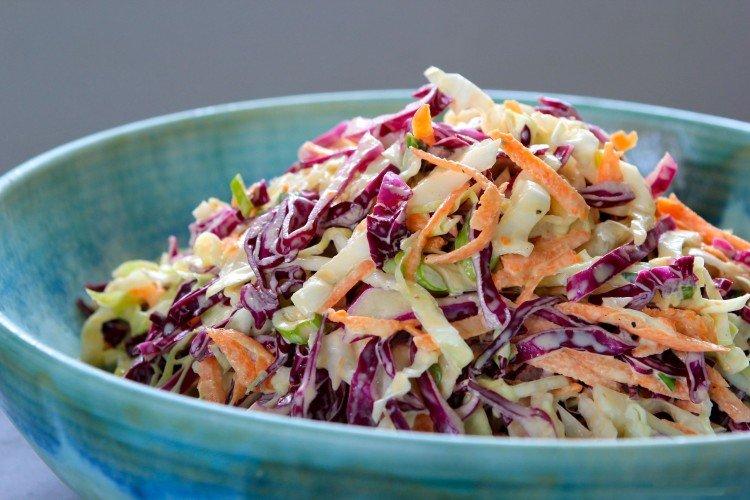 Salad of different types of cabbage with carrots Salad of different types of cabbage with carrots