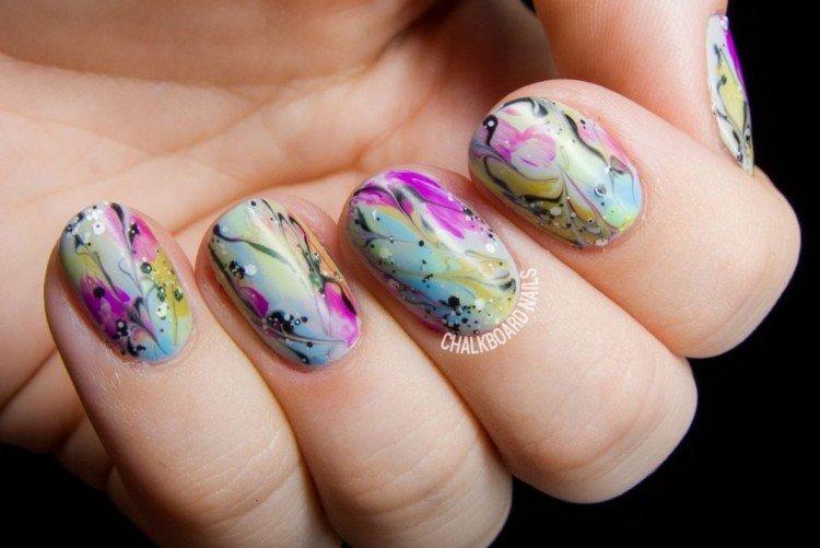 Bright watercolor drawings in manicure Bright watercolor drawings in manicure