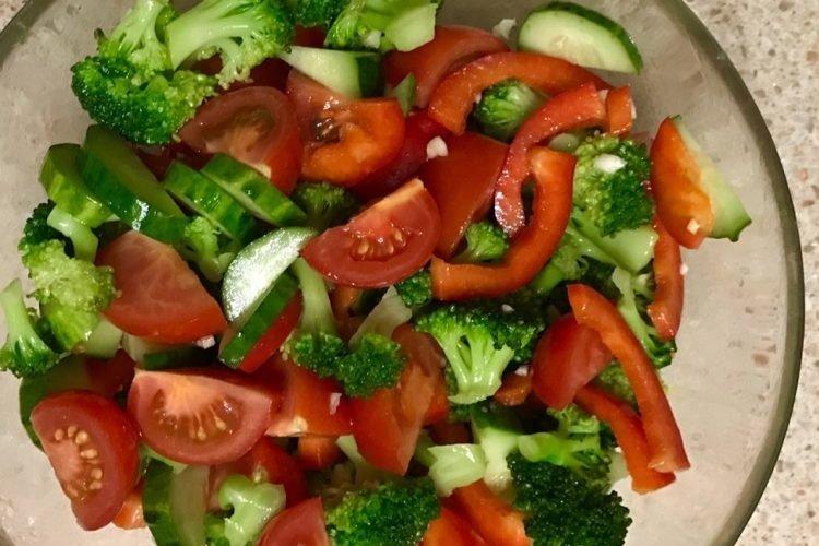 Summer salad with broccoli, cucumbers and tomatoes Summer salad with broccoli, cucumbers and tomatoes